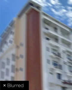 Blurred building facade illustrating unclear architectural details